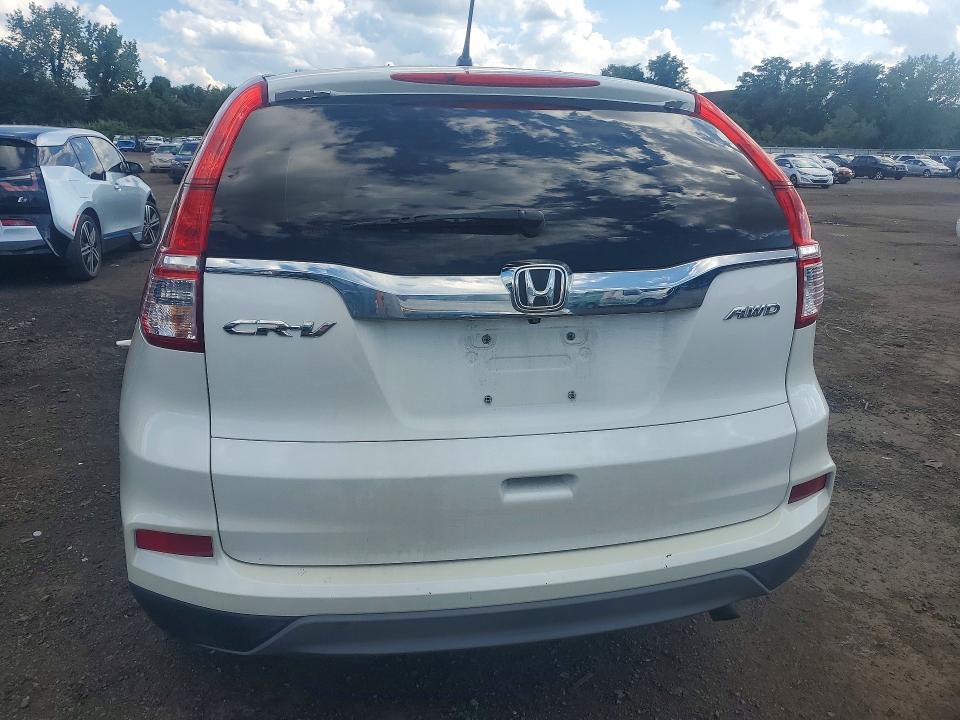 Photo 6 from auction – 2015 HONDA CR-V with VIN 5J6RM4H35FL049147