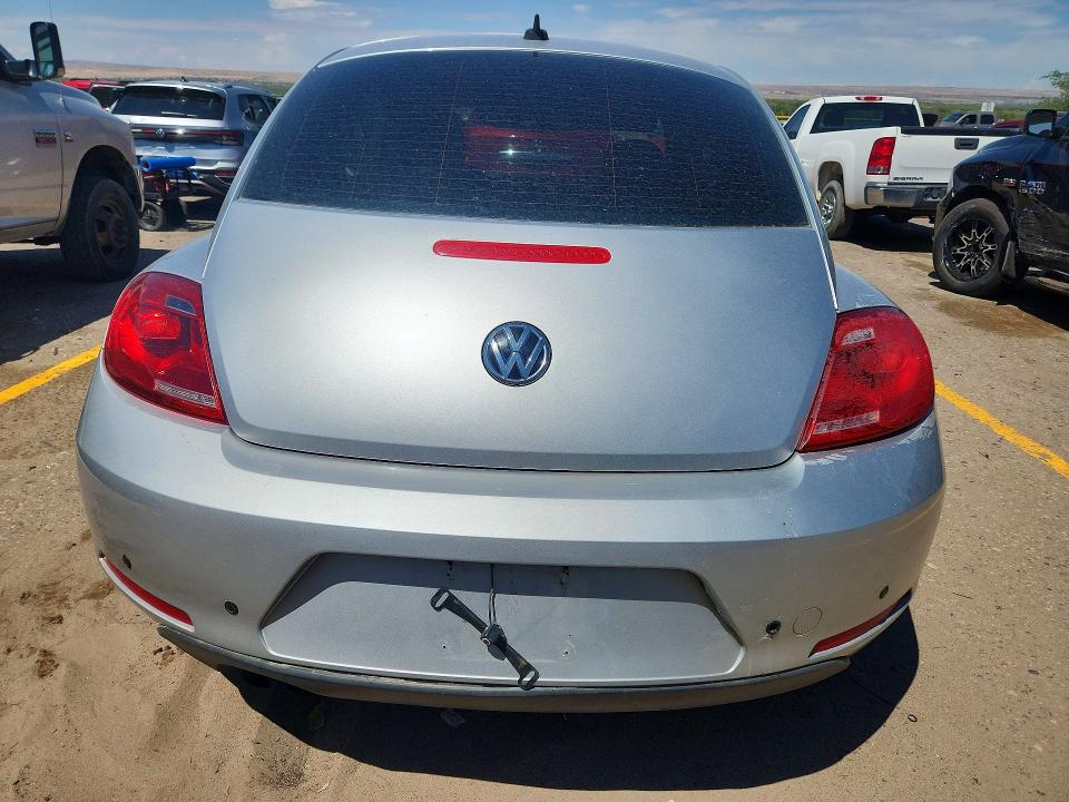 Photo 6 from auction – 2014 VOLKSWAGEN BEETLE with VIN 3VWJ07AT9EM661825