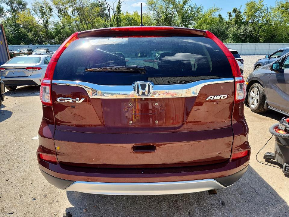 Photo 6 from auction – 2016 HONDA CR-V with VIN 5J6RM4H59GL020687