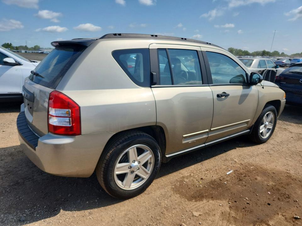 Photo 3 from auction – 2009 JEEP COMPASS with VIN 1J4FT47A69D173853