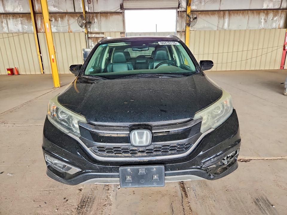 Photo 5 from auction – 2016 HONDA CR-V with VIN 5J6RM4H97GL000439