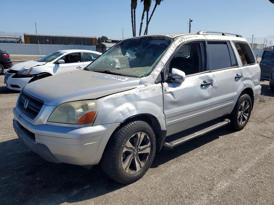 HONDA PILOT 2003 with VIN 2HKYF185X3H586463 - Photo from auction