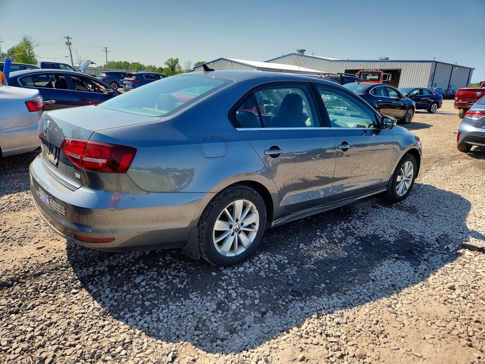 Photo 3 from auction – 2016 VOLKSWAGEN JETTA with VIN 3VWD67AJ1GM392152