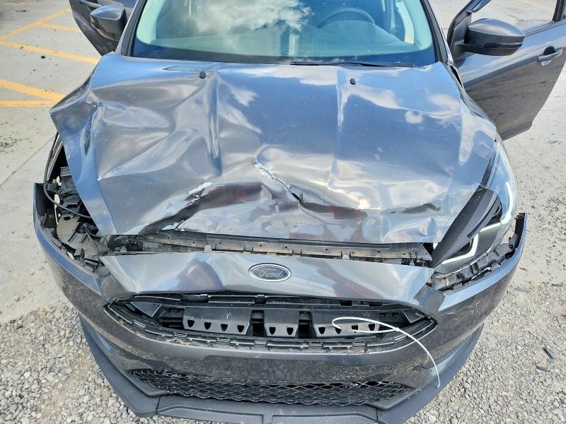 Photo 11 from auction – 2015 FORD FOCUS with VIN 1FADP3K20FL386624