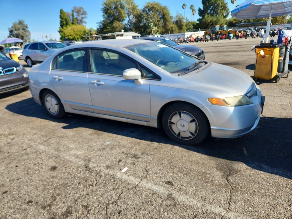 Photo 4 from auction – 2006 HONDA CIVIC with VIN JHMFA36236S023902