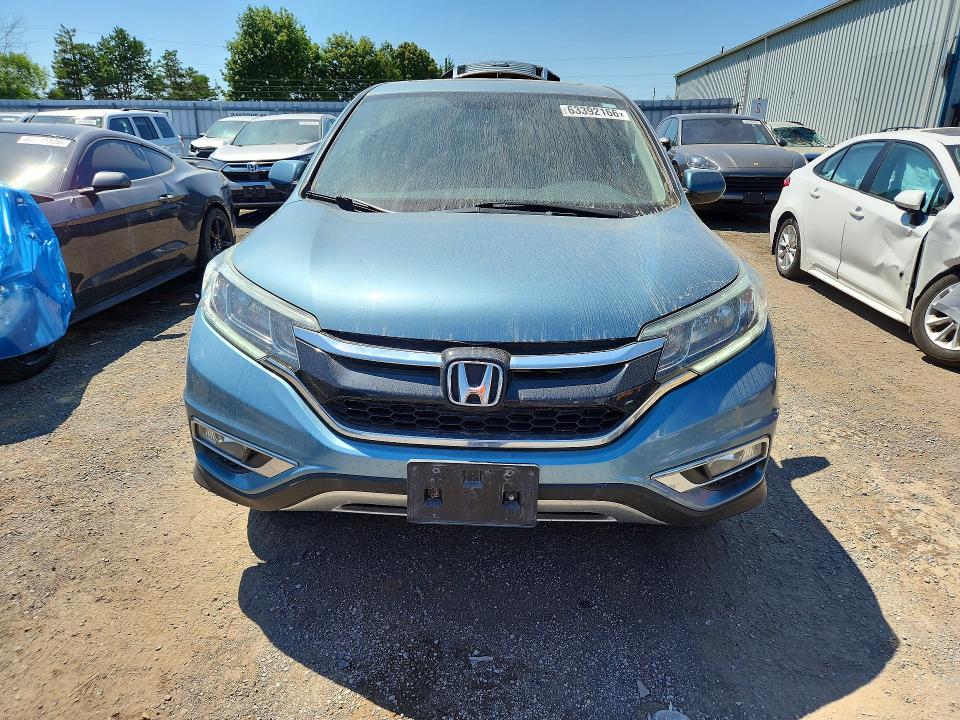 Photo 5 from auction – 2015 HONDA CR-V with VIN 2HKRM4H76FH114911