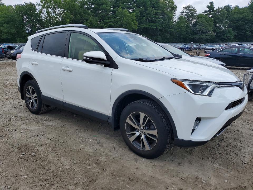 Photo 4 from auction – 2018 TOYOTA RAV4 with VIN JTMRFREV0JJ726466