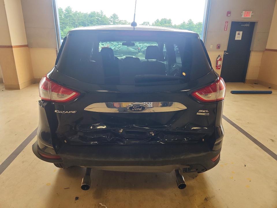 Photo 6 from auction – 2013 FORD ESCAPE with VIN 1FMCU9HX0DUD30268