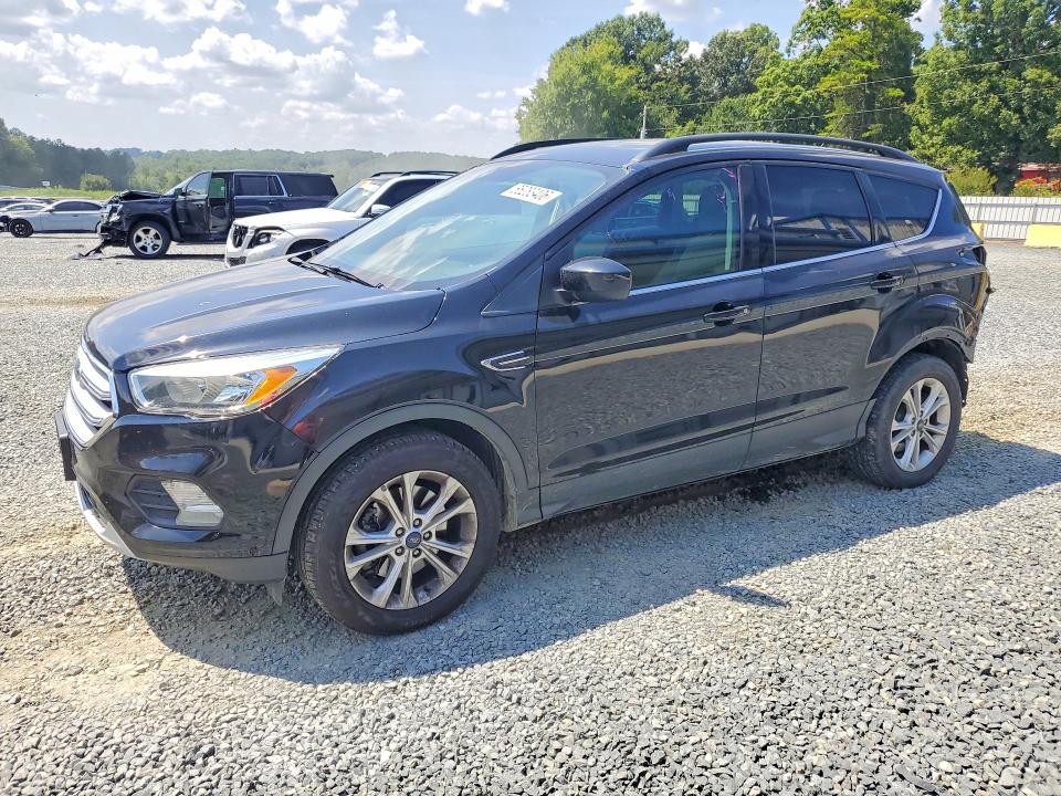 FORD ESCAPE 2018 z numerem VIN 1FMCU9GD6JUB76085 - Zdjęcie z aukcji