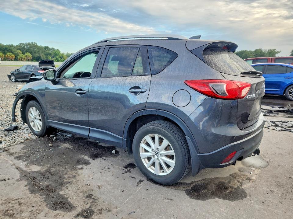 Photo 2 from auction – 2014 MAZDA CX-5 with VIN JM3KE2CY5E0312272