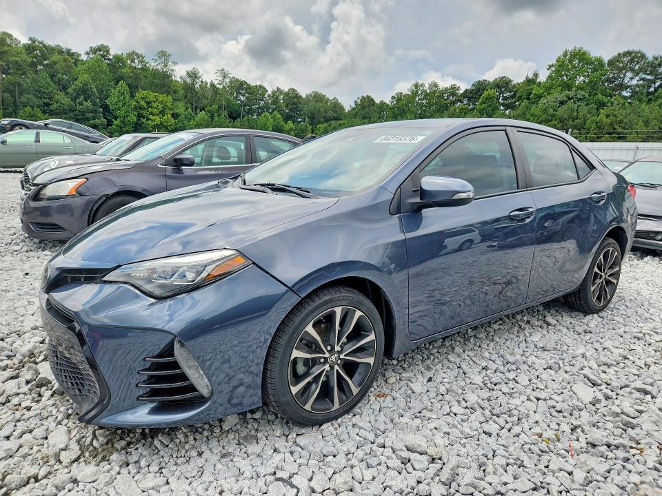 TOYOTA COROLLA 2018 with VIN 5YFBURHE8JP838527 - Photo from auction