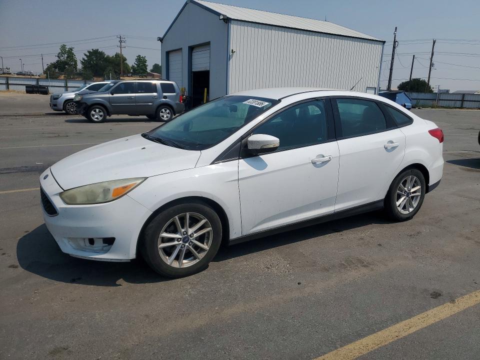FORD FOCUS 2016 with VIN 1FADP3F22GL221136 - Photo from auction
