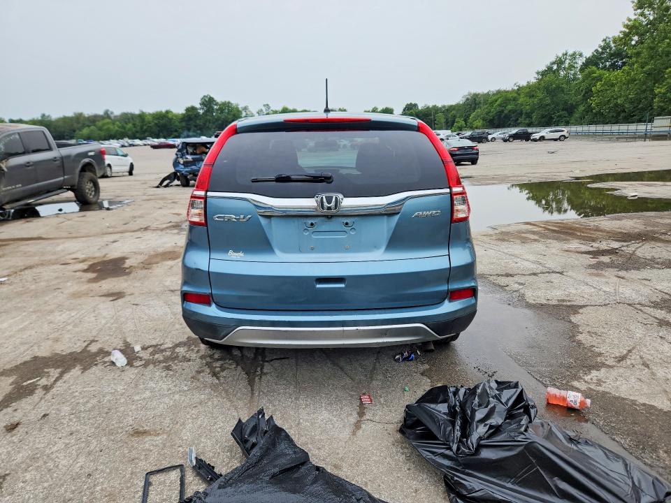 Photo 6 from auction – 2015 HONDA CR-V with VIN 2HKRM4H52FH611436