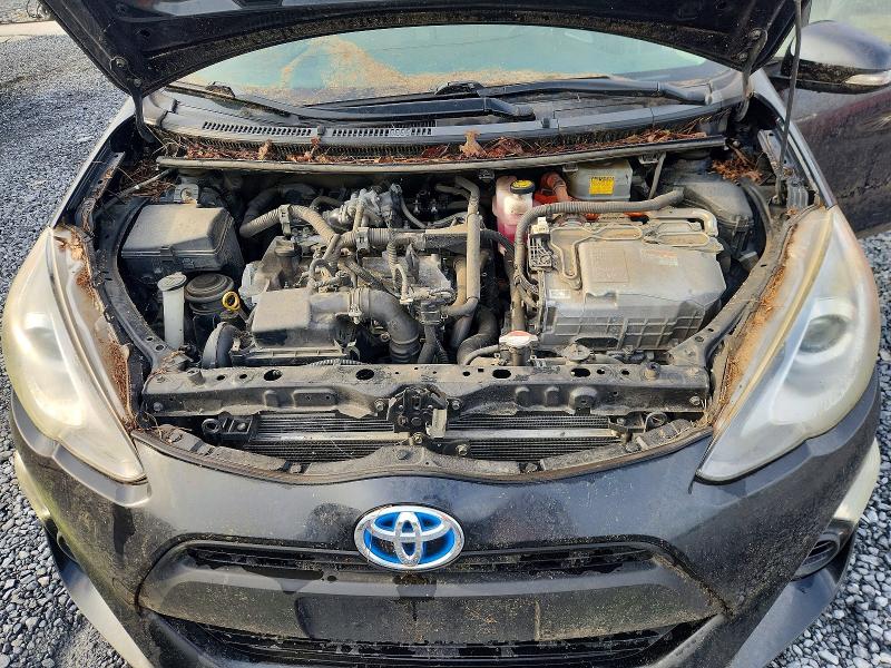 Photo 11 from auction – 2015 TOYOTA PRIUS C with VIN JTDKDTB3XF1108747