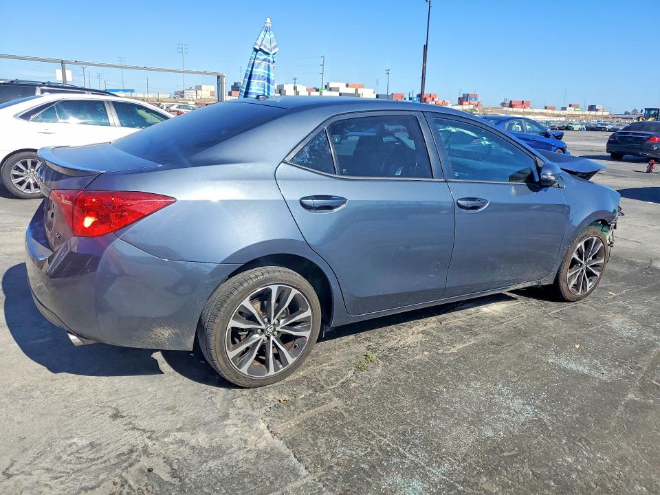 Photo 3 from auction – 2017 TOYOTA COROLLA with VIN 5YFBURHE7HP574906