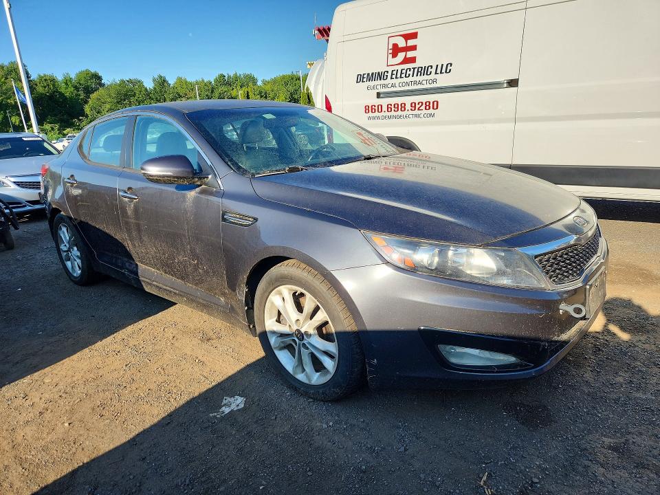 Photo 4 from auction – 2011 KIA OPTIMA with VIN KNAGN4A74B5119028