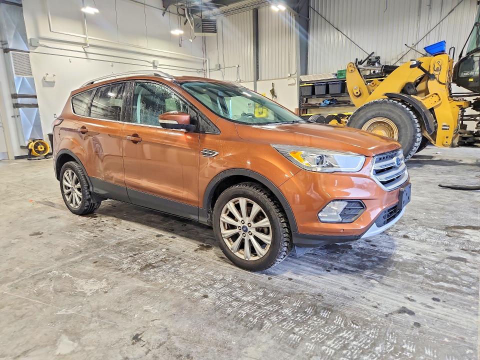 Photo 4 from auction – 2017 FORD ESCAPE with VIN 1FMCU9J91HUE40540