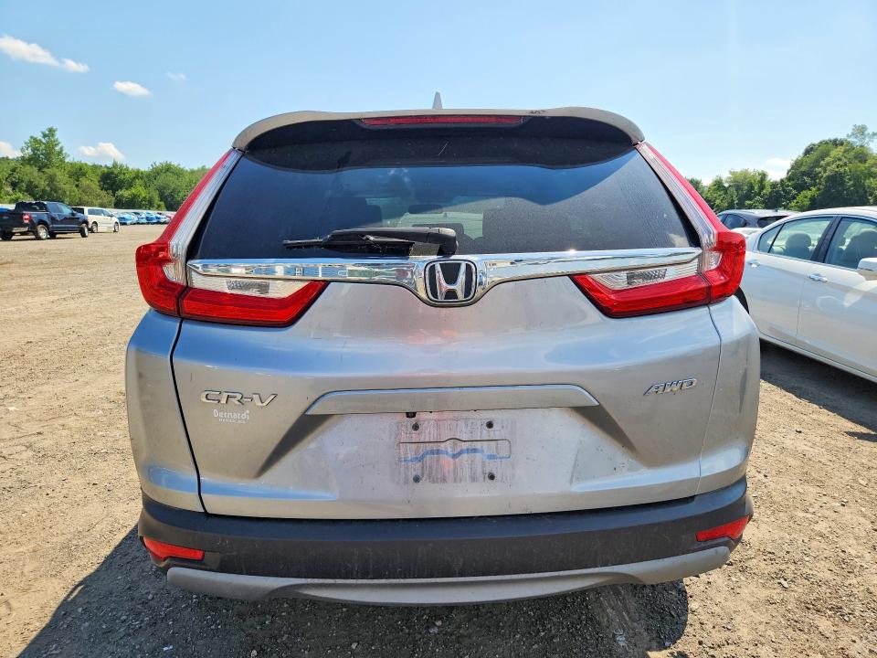 Photo 6 from auction – 2018 HONDA CR-V with VIN 7FARW2H57JE009321