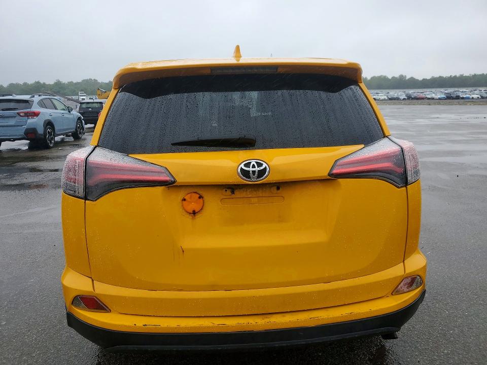 Photo 6 from auction – 2018 TOYOTA RAV4 with VIN JTMBFREV6JD256623