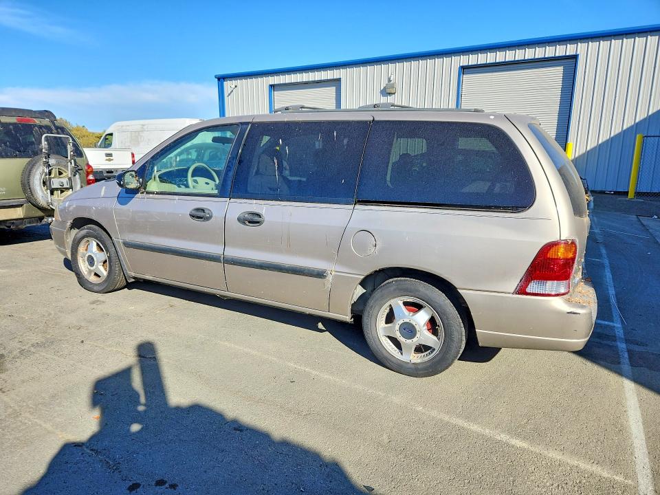 Photo 2 from auction – 2003 FORD WINDSTAR with VIN 2FMDA51443BB60877
