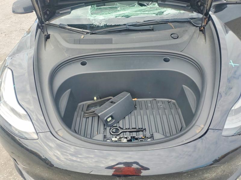 Photo 11 from auction – 2022 TESLA MODEL 3 with VIN 5YJ3E1EB4NF111061