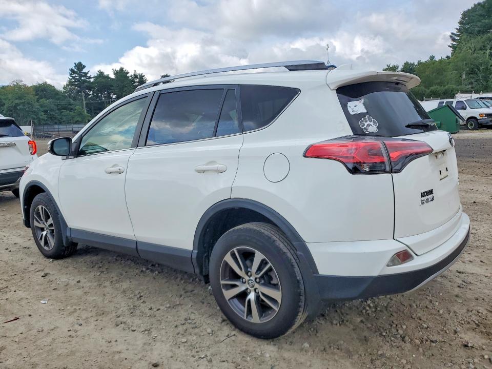 Photo 2 from auction – 2018 TOYOTA RAV4 with VIN JTMRFREV0JJ726466