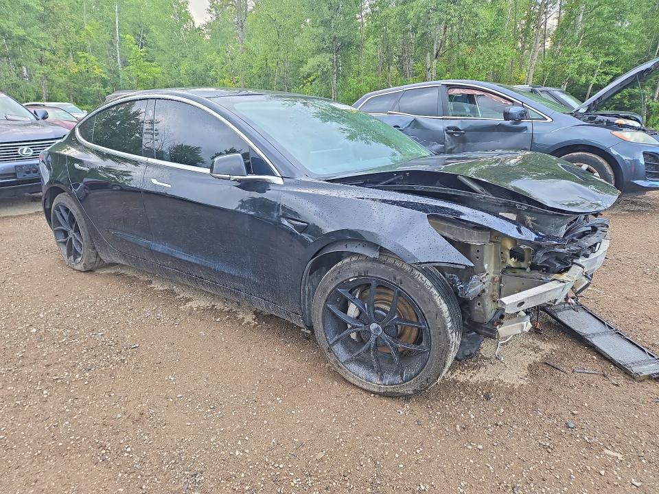 Photo 4 from auction – 2019 TESLA MODEL 3 with VIN 5YJ3E1EBXKF199884