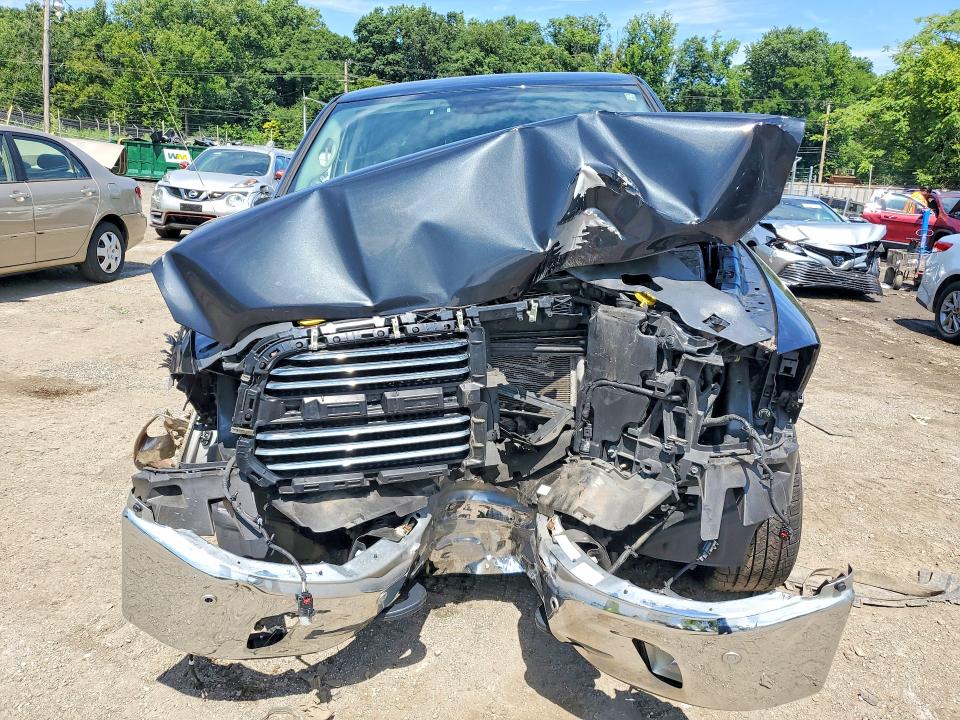 Photo 5 from auction – 2018 RAM 1500 with VIN 1C6RR7GT5JS345379