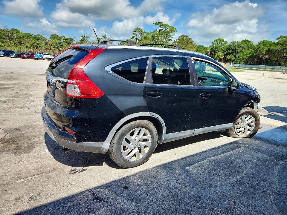 Photo 3 from auction – 2015 HONDA CR-V with VIN 5J6RM4H74FL134211