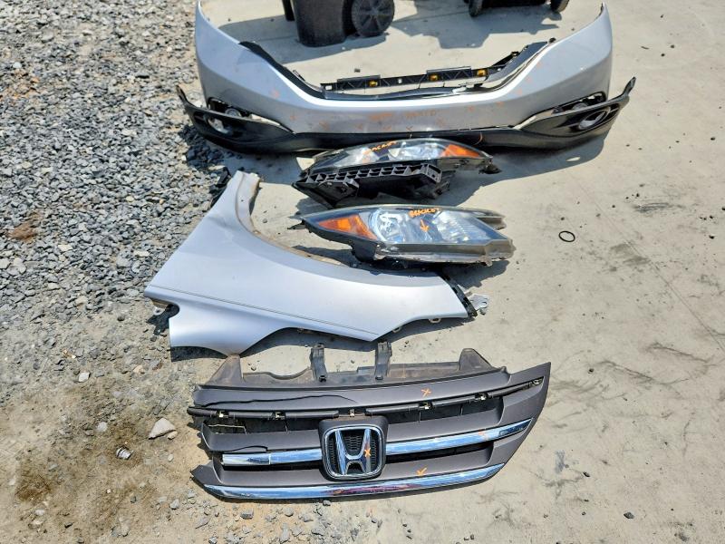 Photo 13 from auction – 2013 HONDA CR-V with VIN 5J6RM3H73DL011569