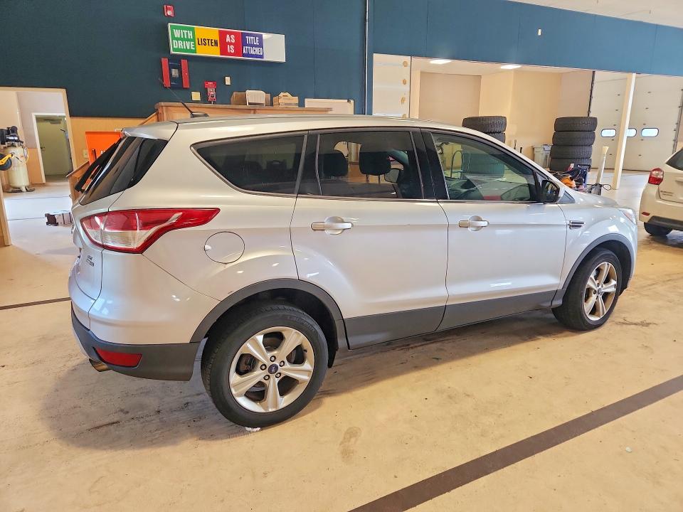 Photo 3 from auction – 2016 FORD ESCAPE with VIN 1FMCU9GX9GUA57210