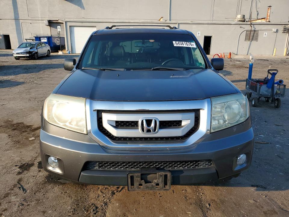 Photo 5 from auction – 2011 HONDA PILOT with VIN 5FNYF4H52BB061797