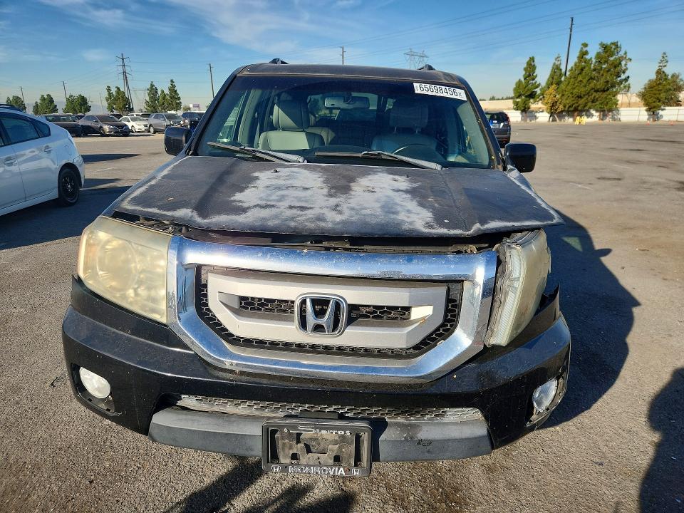 Photo 5 from auction – 2009 HONDA PILOT with VIN 5FNYF38579B019677