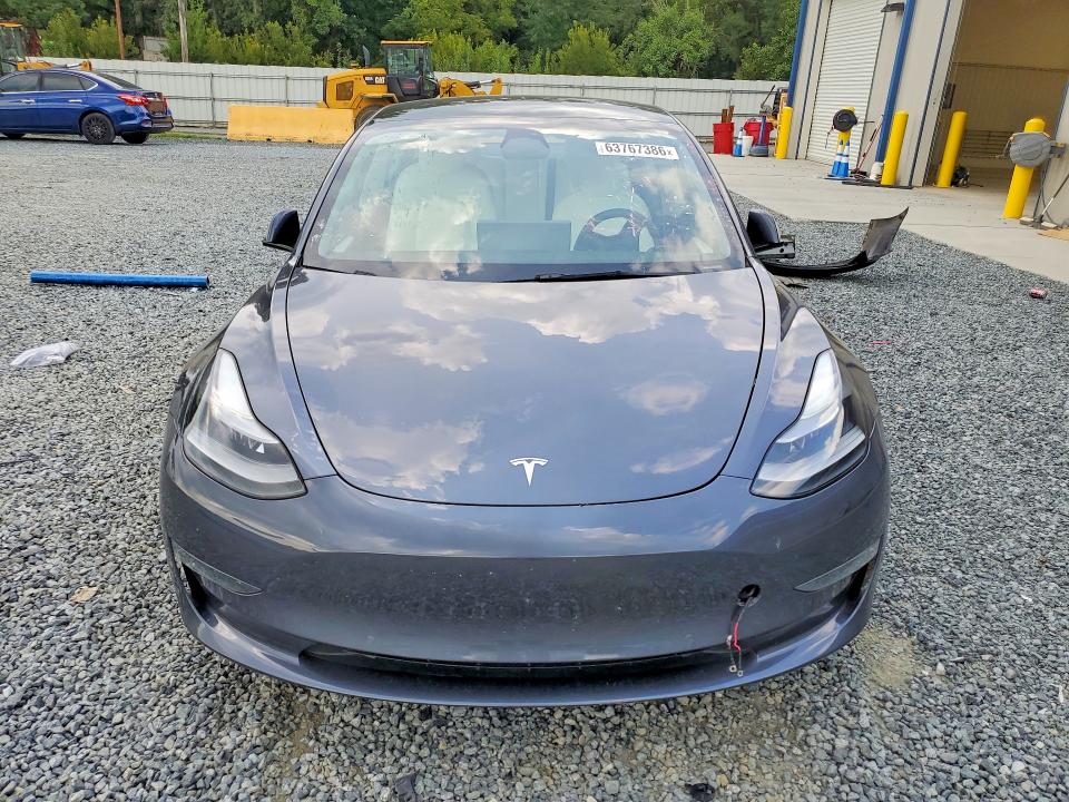Photo 5 from auction – 2022 TESLA MODEL 3 with VIN 5YJ3E1EC9NF268027