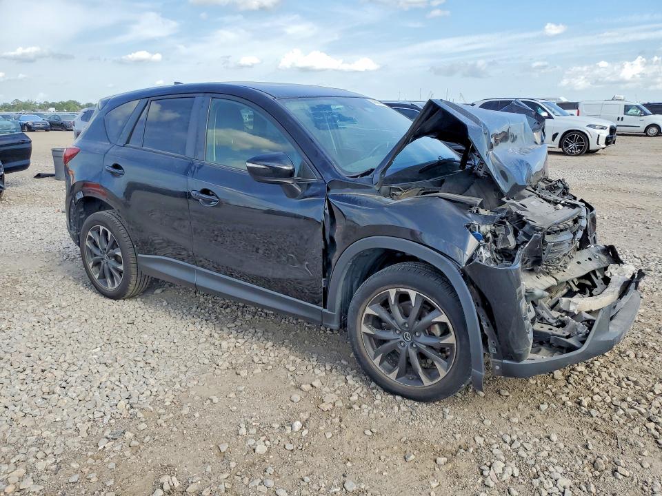 Photo 4 from auction – 2016 MAZDA CX-5 with VIN JM3KE2DY5G0708932
