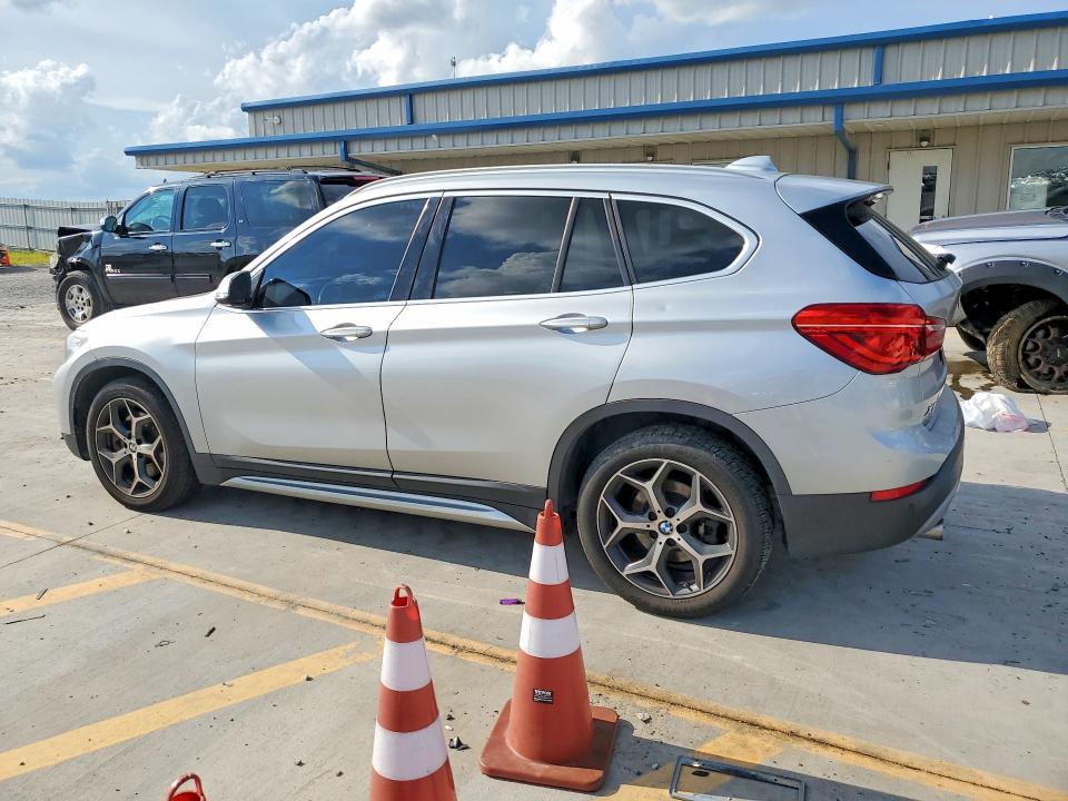 Photo 2 from auction – 2018 BMW X1 with VIN WBXHU7C38J3H43856