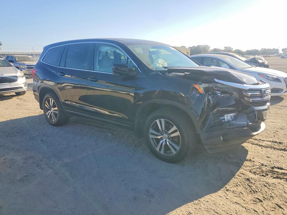 Photo 4 from auction – 2016 HONDA PILOT with VIN 5FNYF6H3XGB027589