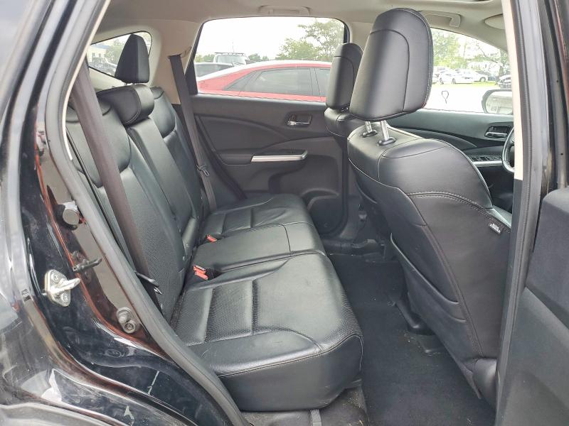 Photo 11 from auction – 2016 HONDA CR-V with VIN 5J6RM4H98GL130973