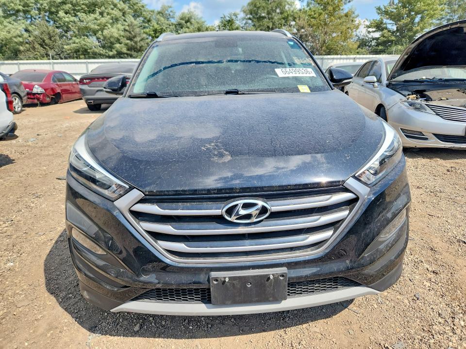 Photo 5 from auction – 2017 HYUNDAI TUCSON with VIN KM8J3CA28HU351283