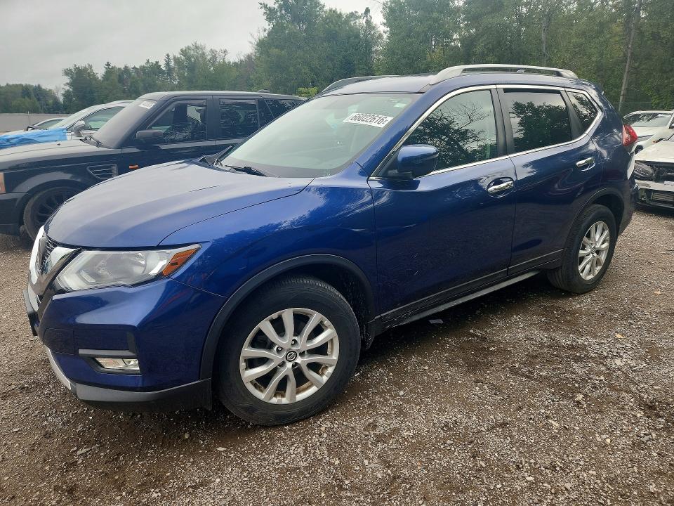 NISSAN ROGUE 2018 with VIN 5N1AT2MT9JC717780 - Photo from auction