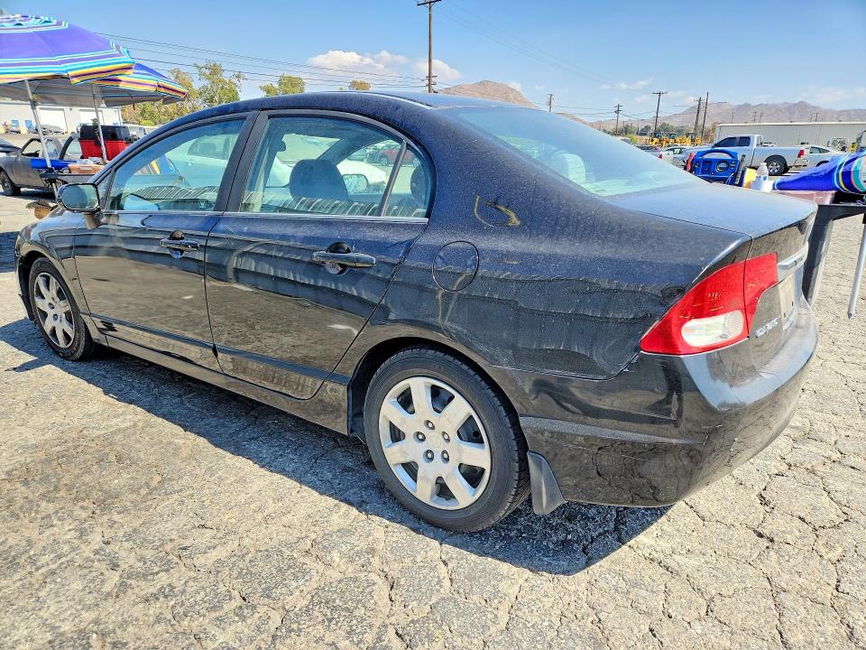 Photo 2 from auction – 2010 HONDA CIVIC with VIN 19XFA1F50AE045710