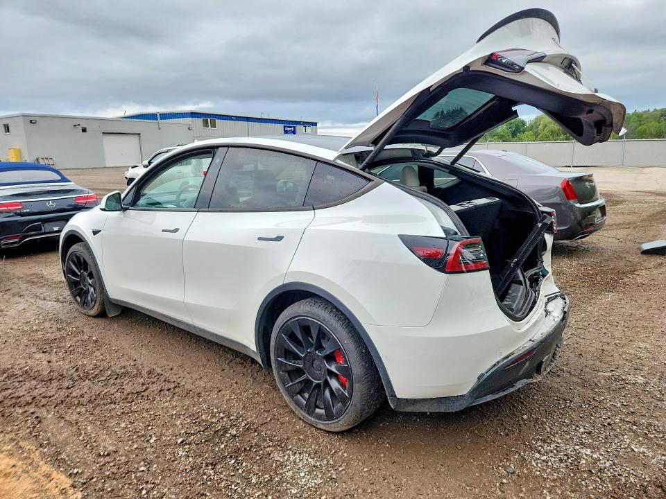 Photo 2 from auction – 2022 TESLA MODEL Y with VIN 7SAYGAEE2NF359547