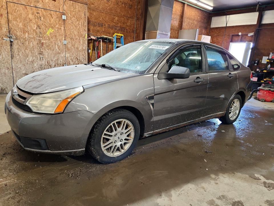FORD FOCUS 2010 with VIN 1FAHP3FNXAW140810 - Photo from auction