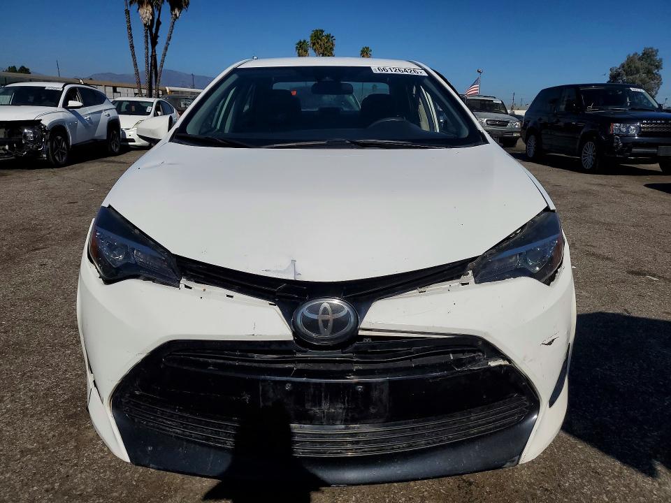 Photo 5 from auction – 2018 TOYOTA COROLLA with VIN 5YFBURHE9JP792254