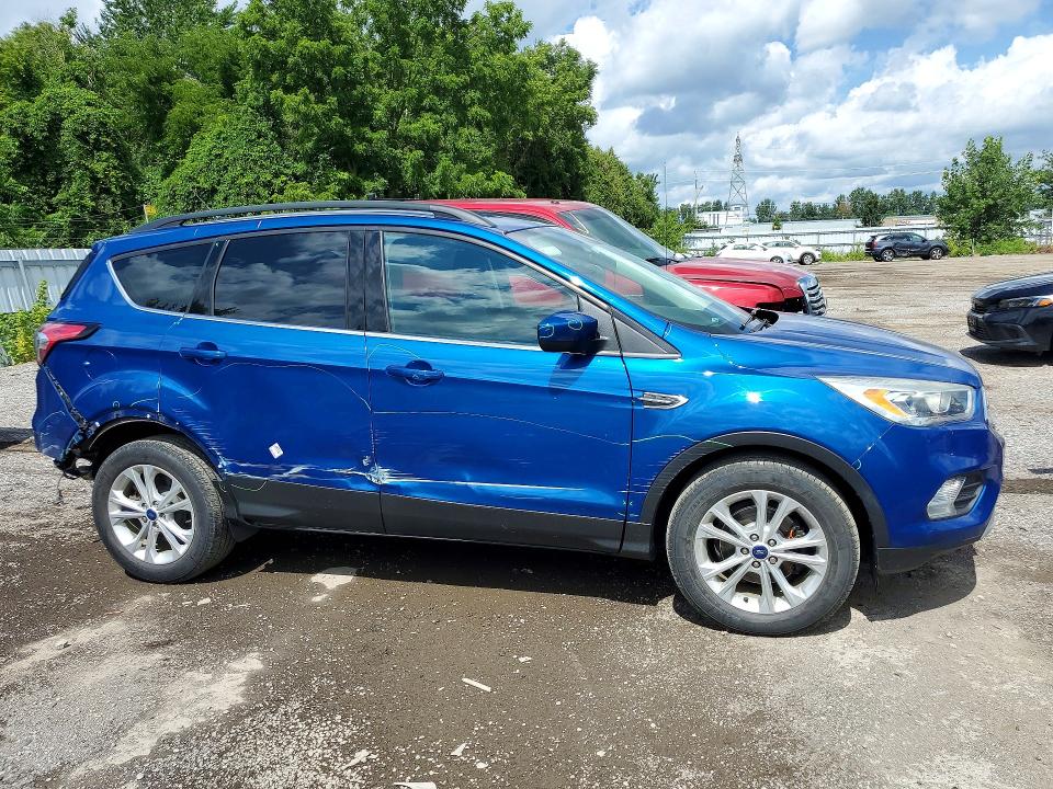 Photo 4 from auction – 2017 FORD ESCAPE with VIN 1FMCU0GD4HUD78901