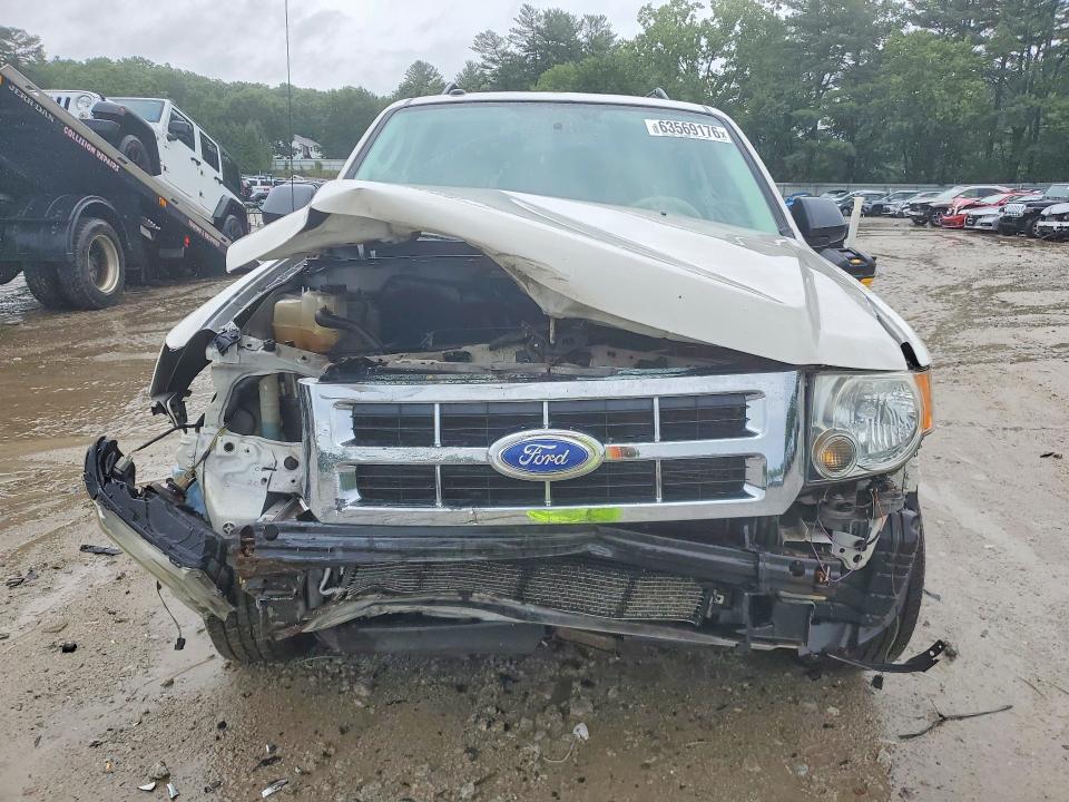Photo 5 from auction – 2011 FORD ESCAPE with VIN 1FMCU0D79BKC08020
