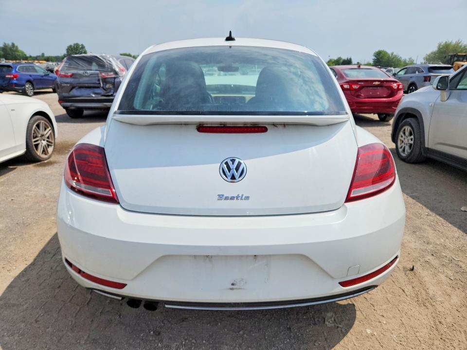 Photo 6 from auction – 2019 VOLKSWAGEN BEETLE with VIN 3VWJD7AT7KM707071