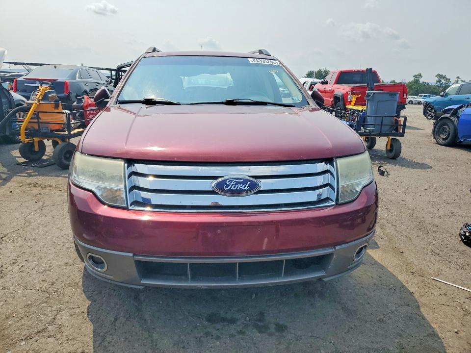 Photo 5 from auction – 2008 FORD TAURUS X with VIN 1FMDK02W08GA45824