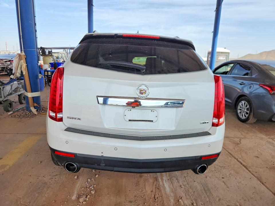 Photo 6 from auction – 2015 CADILLAC SRX with VIN 3GYFNBE33FS623716