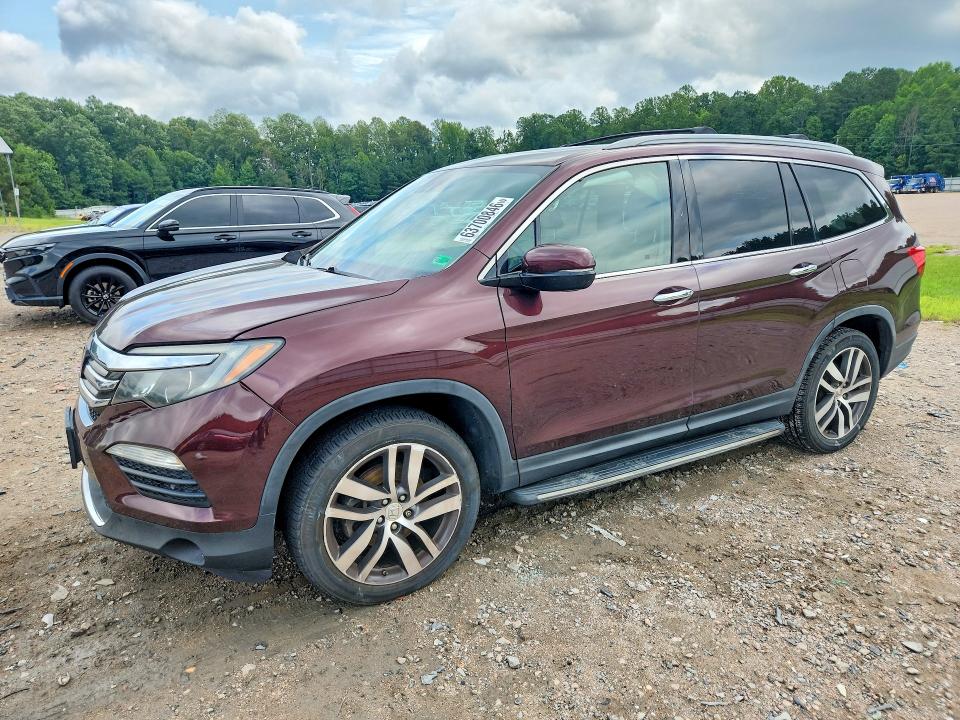 HONDA PILOT 2016 with VIN 5FNYF5H91GB051326 - Photo from auction